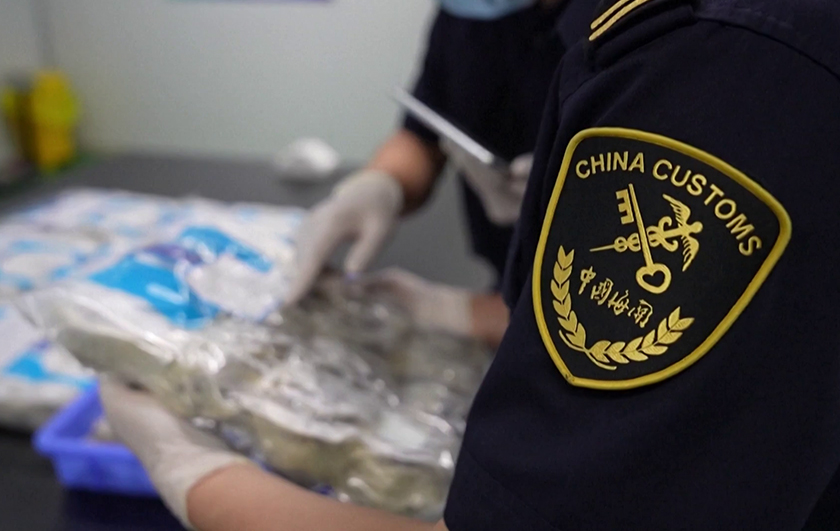 Customs officers inspecting imported edible bird's nest at the Xiamen Customs office. - Screengrab/CCTV/via REUTERS